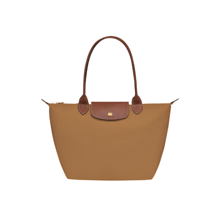 Tote handbag with brown handle and clasp on a light gray background- brown purse
