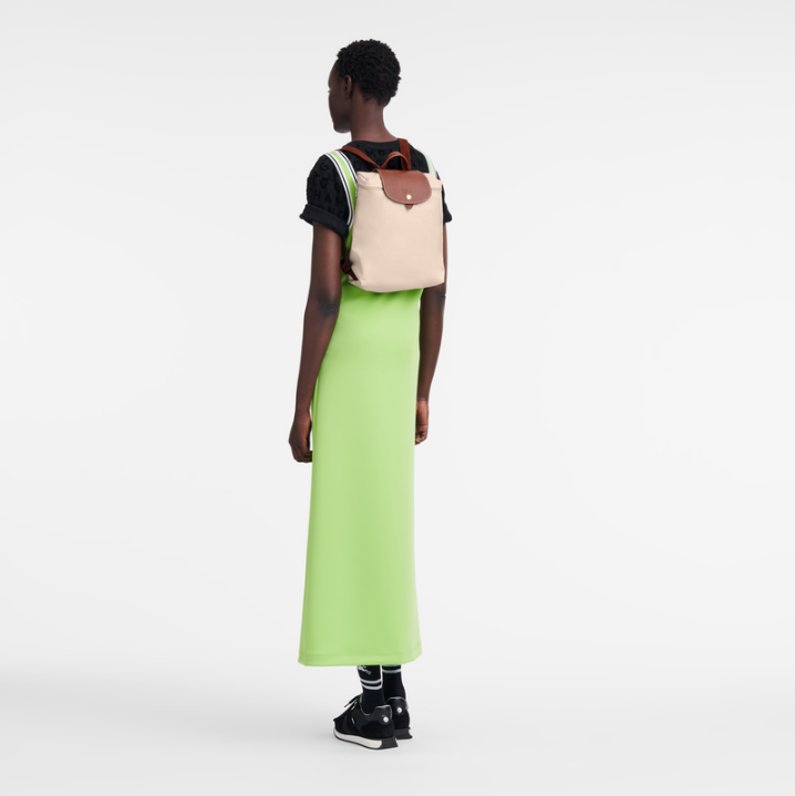 beige the backpack- model wearing