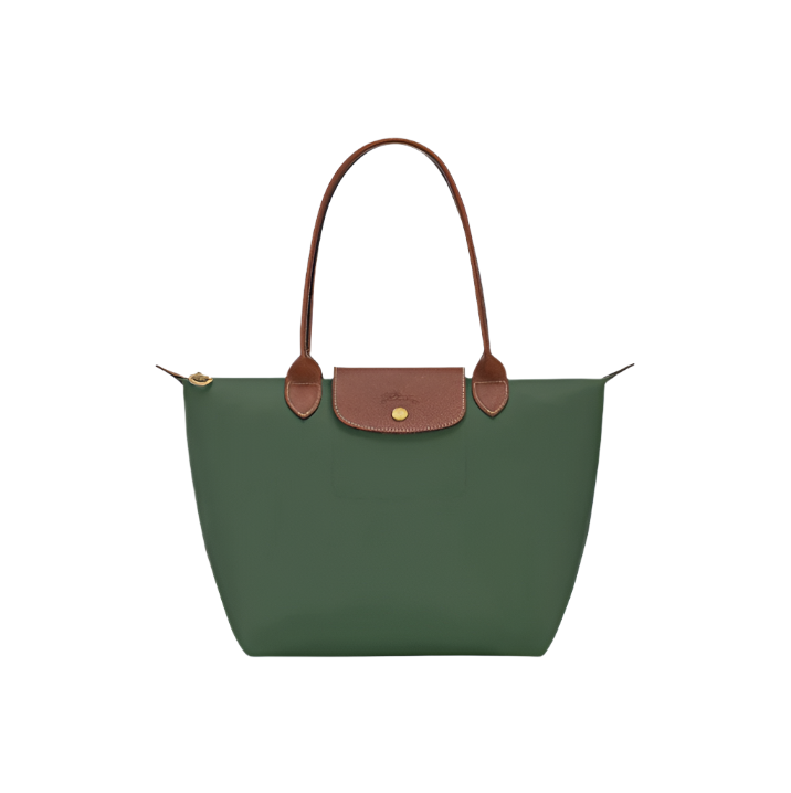 Green handbag with brown handles and trim on a light gray background
