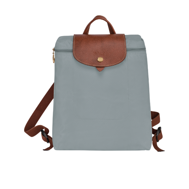 Grey the backpack with brown leather accents on a white background