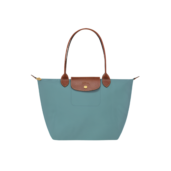 Tote handbag with brown leather handle and accents on a light gray background- teal purse